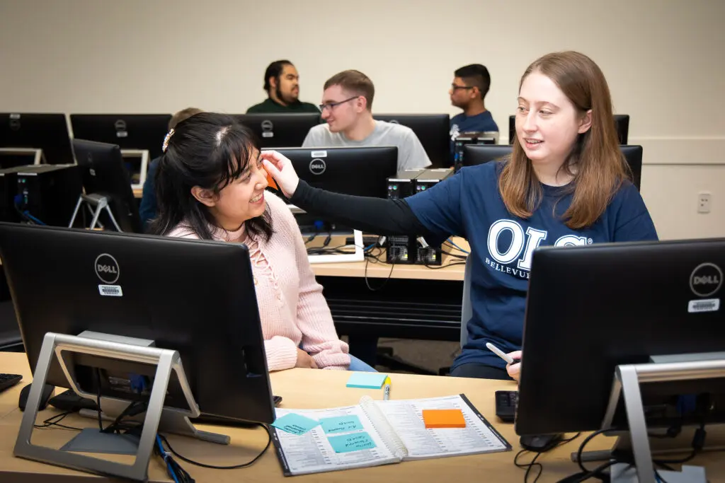 Students work in a computer lab.