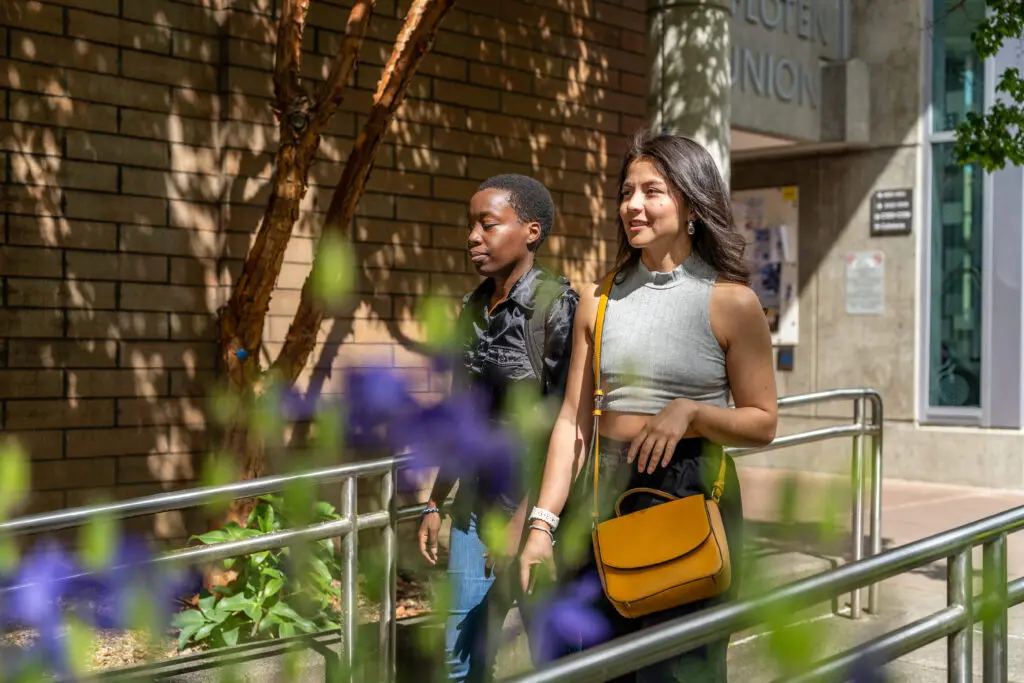 Two students walk past the BC Student Union.