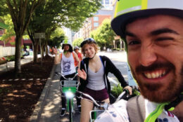 Members of the sustainability team bike riding together