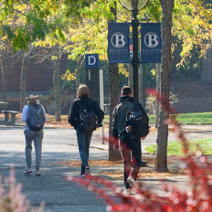 STudents walk to class on BC's campus.