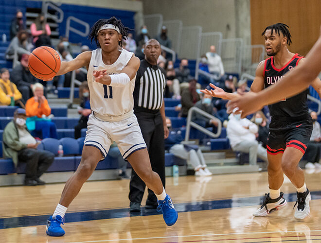 The men's basketball team competes.