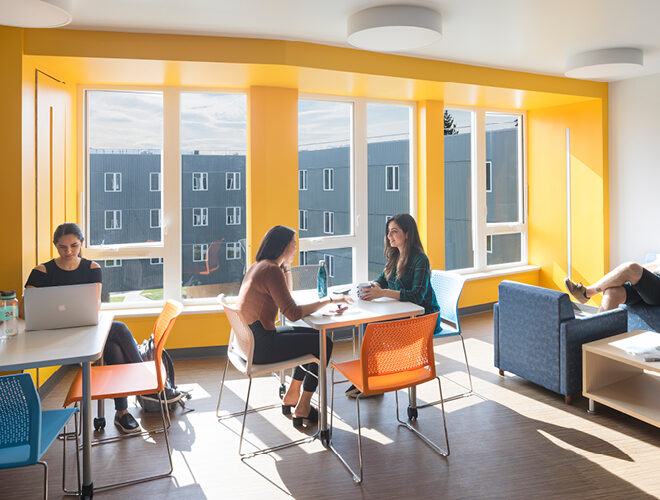 Students study, chat and relax in BC student housing.