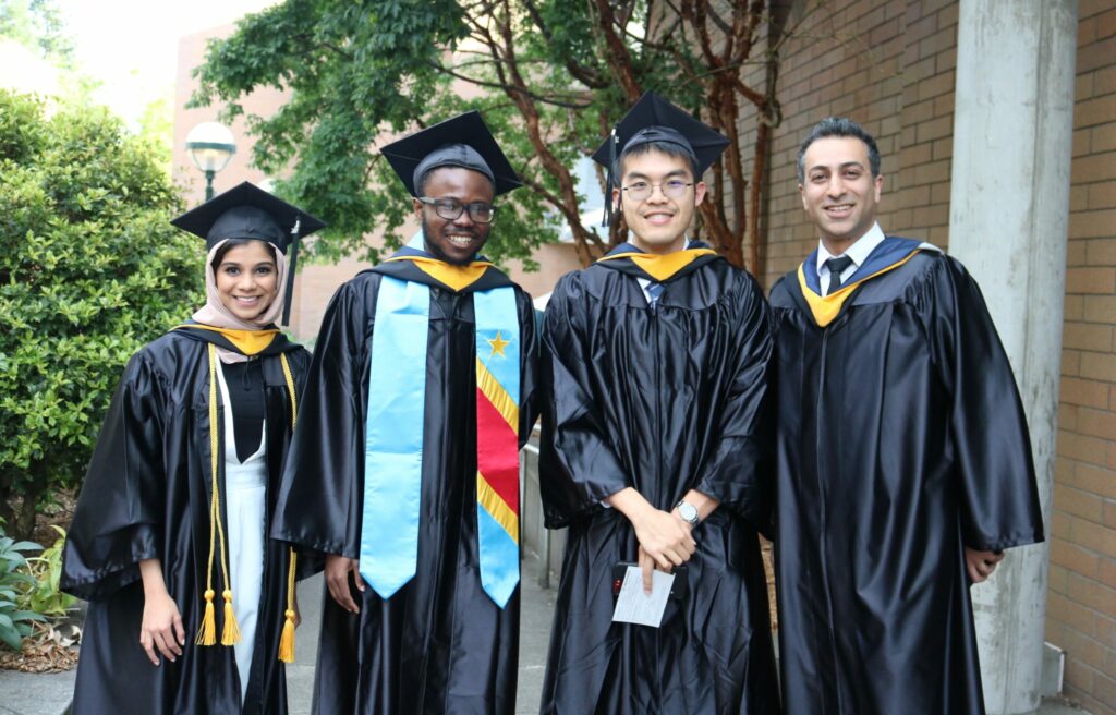 Students pose for a picture prior to the graduation ceremony