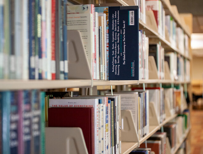 A close-up of rows of library books.