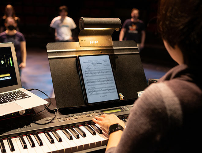 A student at a keyboard