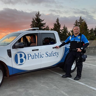 A BC Public Safety officer and vehicle.