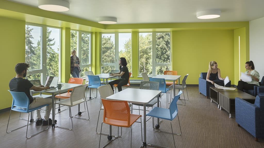 Large study lounge with view of trees.