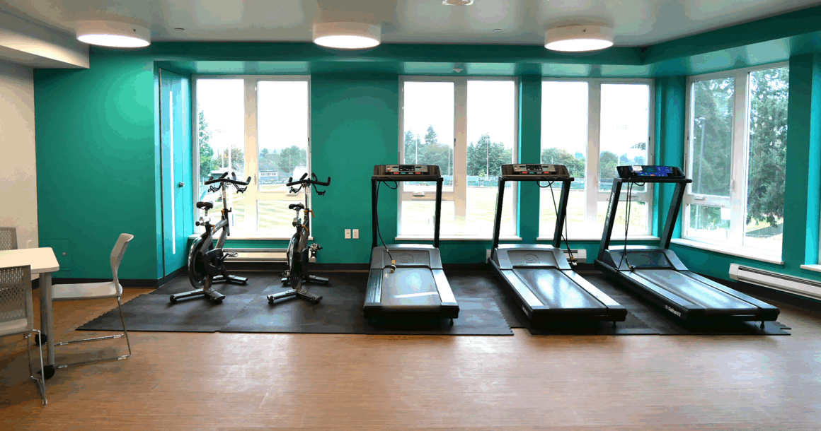 Fitness room with bicycles and treadmills