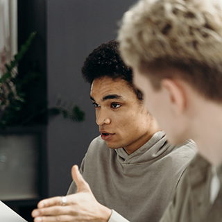 Students discuss a topic in class.