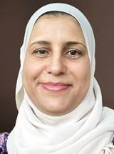 Dr. Muntaha wearing a white hijab