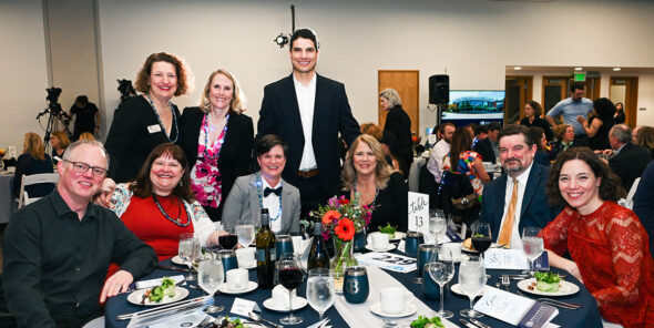 Event attendees smile while at the 2024 Bellevue College Foundation gala.