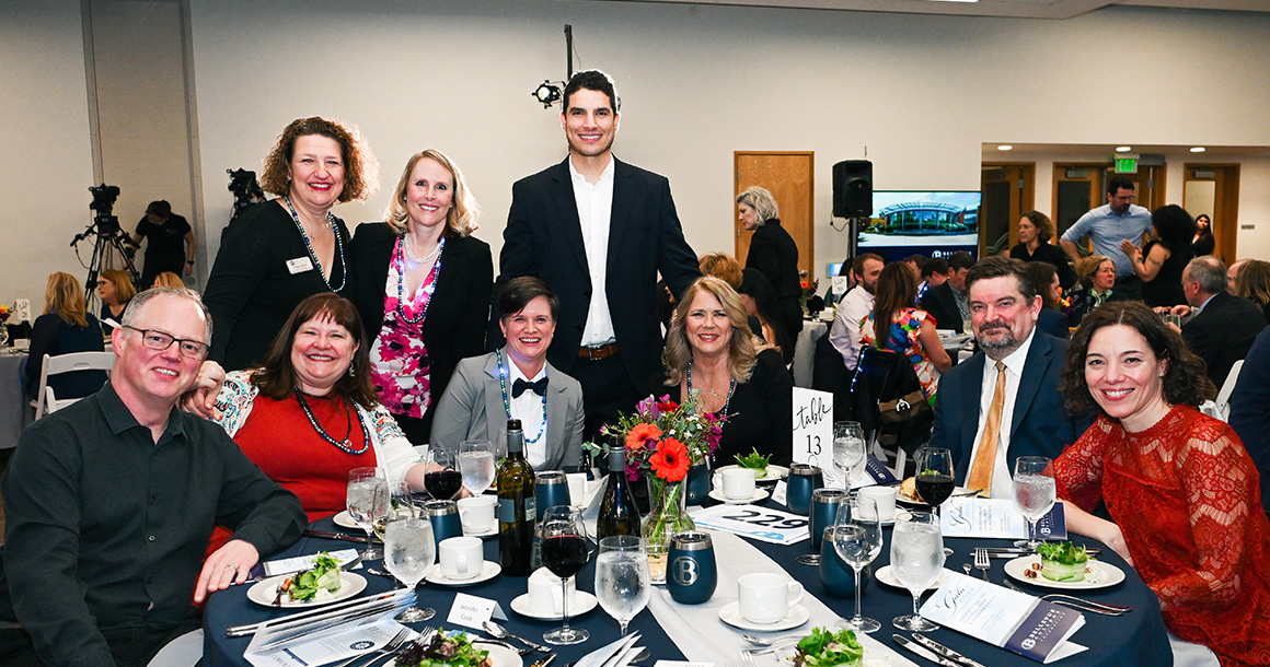 Event attendees smile while at the 2024 Bellevue College Foundation gala.