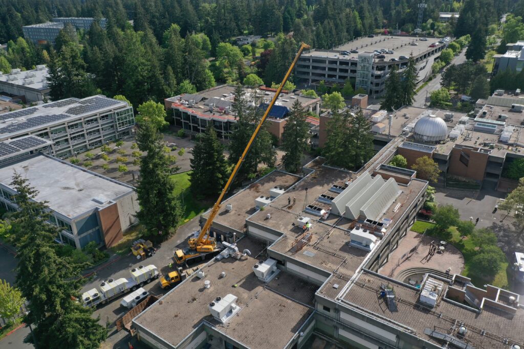 Aerial shot of buildings with crane. 