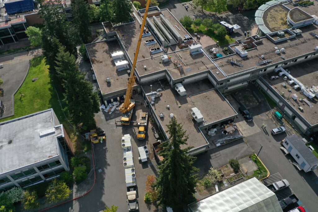 Aerial shot of buildings with crane. 