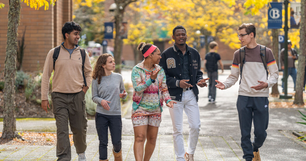Students walk on the Bellevue College campus during Fall.