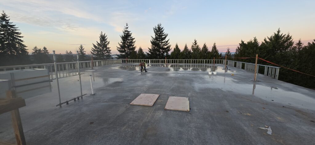 Roof of W Building with cement flooring. 