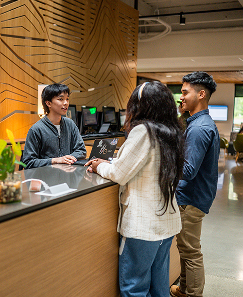 Students are greeted at the Welcome Center in Bellevue College's U Building.