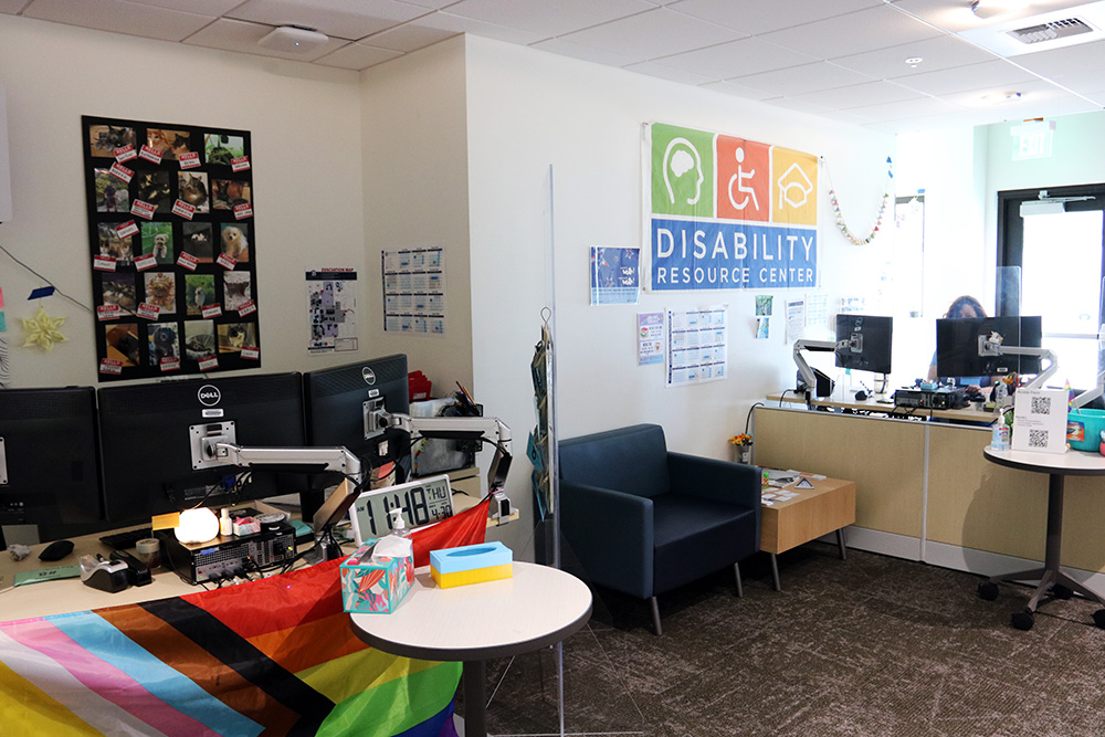 Disability Resource Center lobby with desks, computers, and chairs.