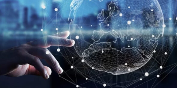 Hand reaches toward digital world in abstract design.