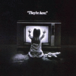 Little girl with her hands on a television screen (from the movie Poltergeist)