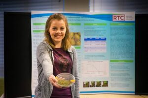 A Student showing her beetles