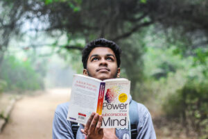 Man holding an open book