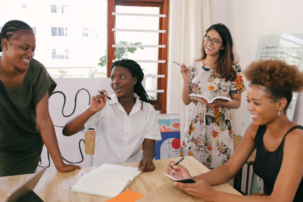 Picture of office workers is part of overall page design.