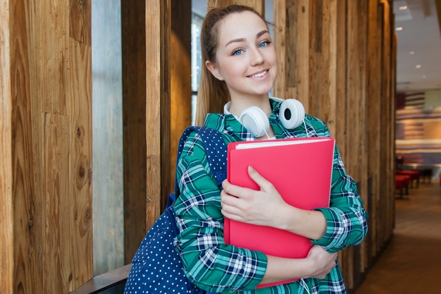 Image of student is decorative and used as part of page design