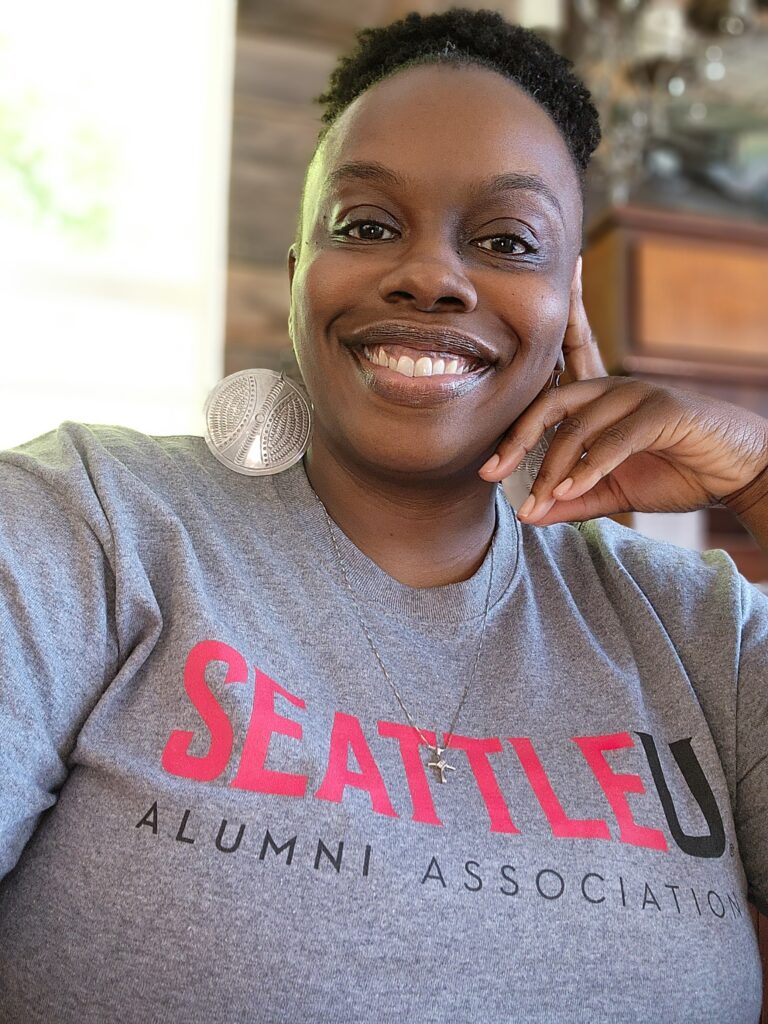 Veratta with an alumni shirt from Seattle University