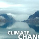 Photo of lake with mountains with the words climate change on the photo