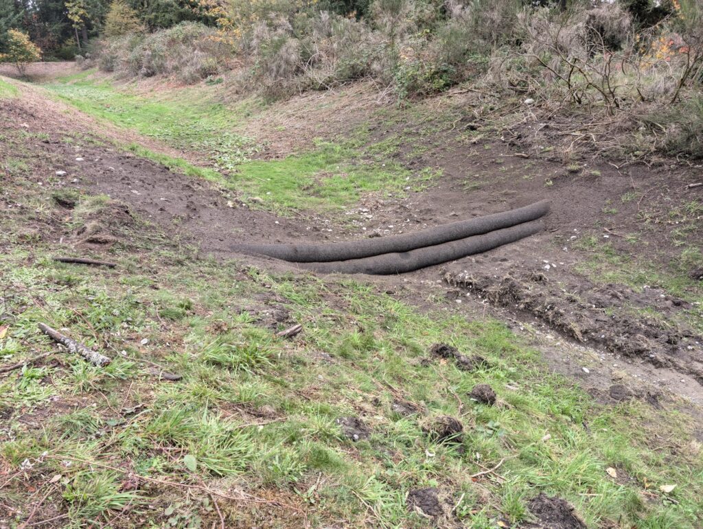Compost BURritos installed in swale