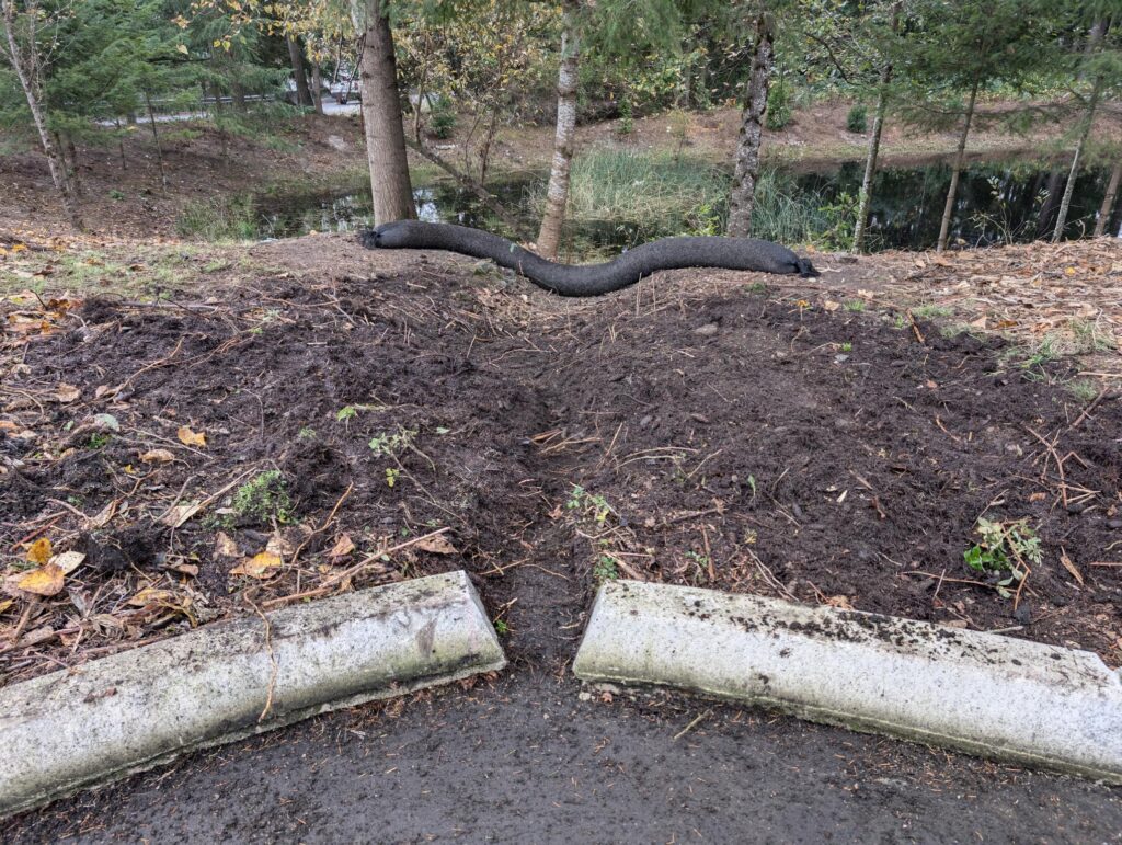 Compost BURrito installed atop the pond