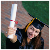 female student raising her diploma up to the sky