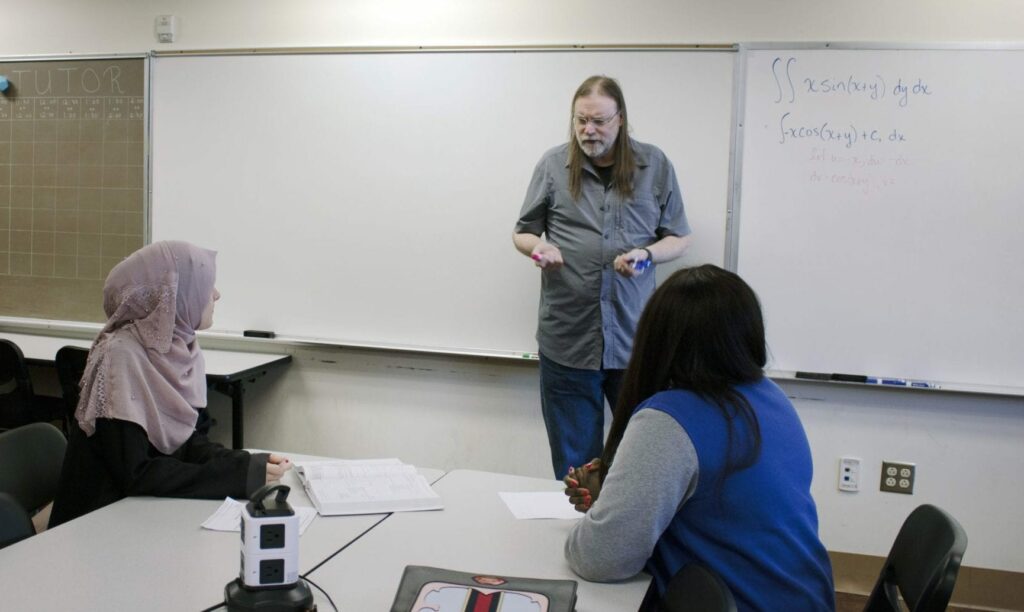 Students getting tutored in math lab