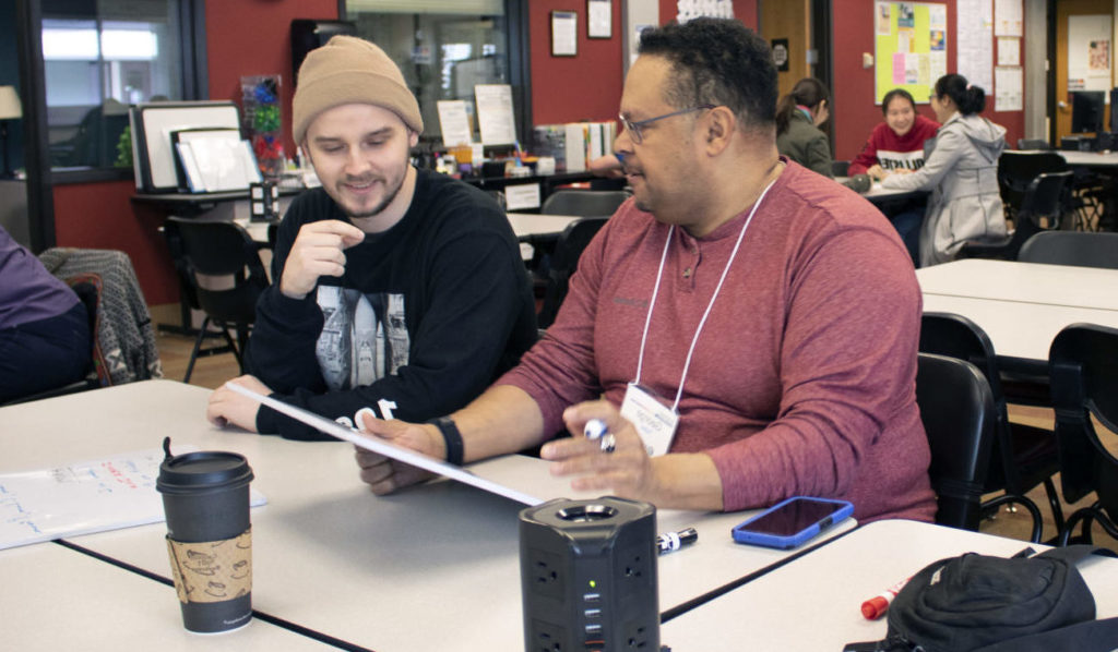 Tutor helping student in ASC