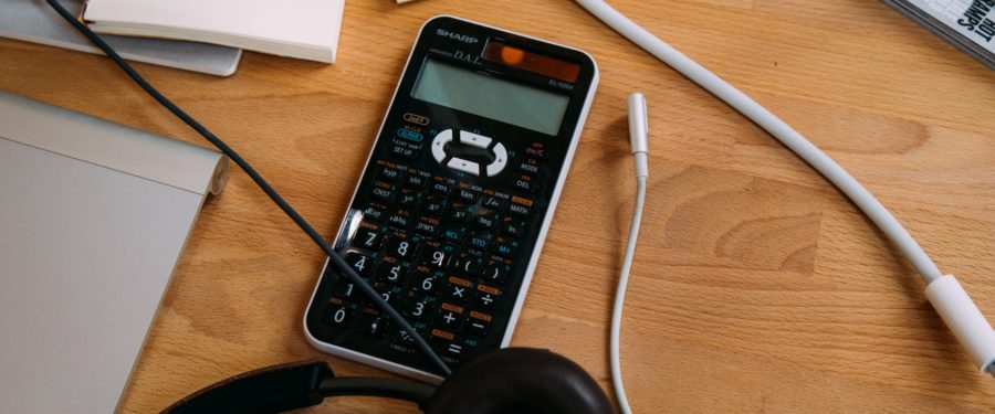 table with calculator on it