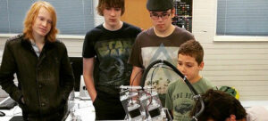Students looking at machinery at the RISE MakerSpace