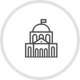 Icon image of an outlined Capitol building, representing the Policy & Governance pathway.