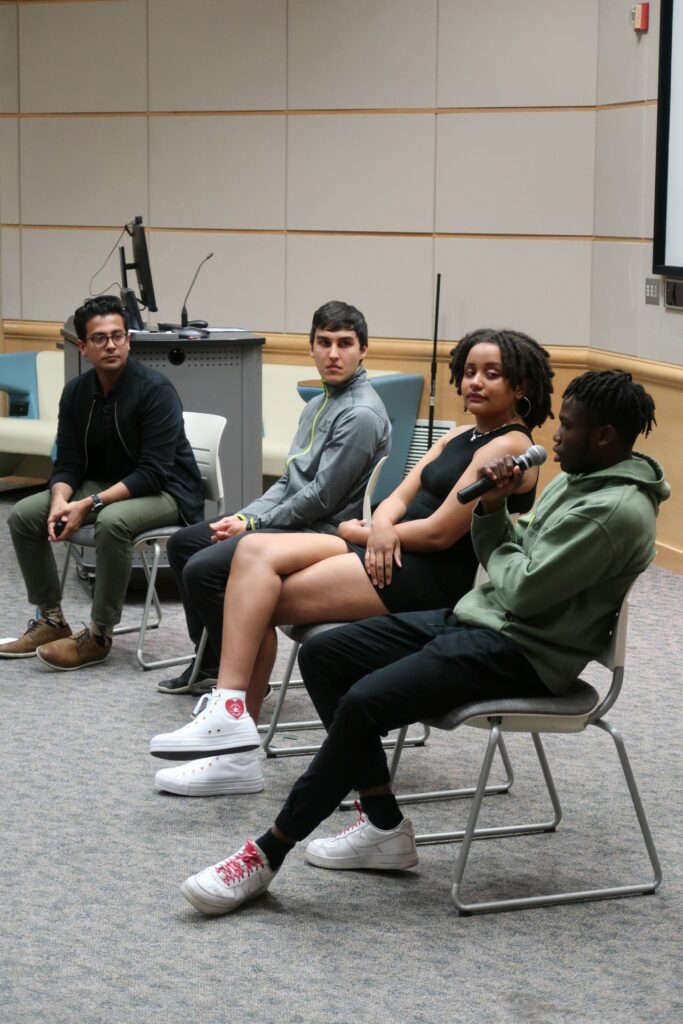 Bellevue College students speaking on a panel during Voices United event