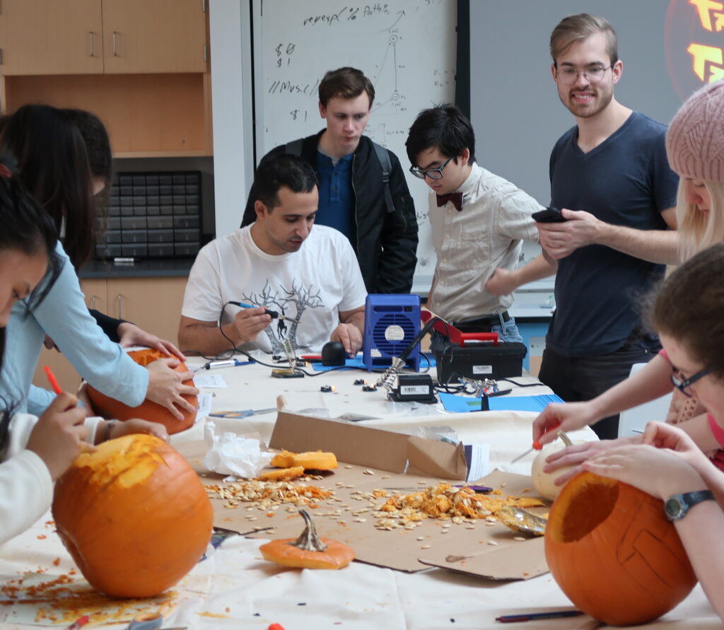 Students attending the pumpkin event