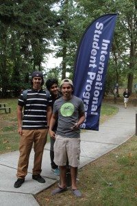 Students standing in front of International Student Programs sign