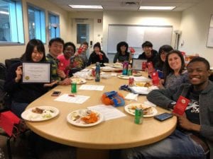 International staffers and students have a celebratory lunch