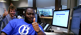 Photo of Help Desk staff at desk