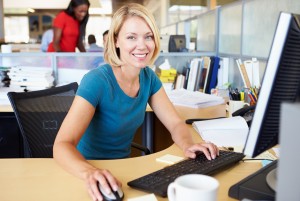 Woman working At computer