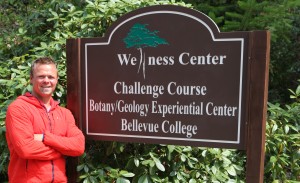 Peter Prescott stands near the entrance to the BC Challenge Course