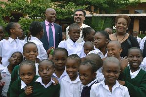 Bellevue College representatives with students at African school