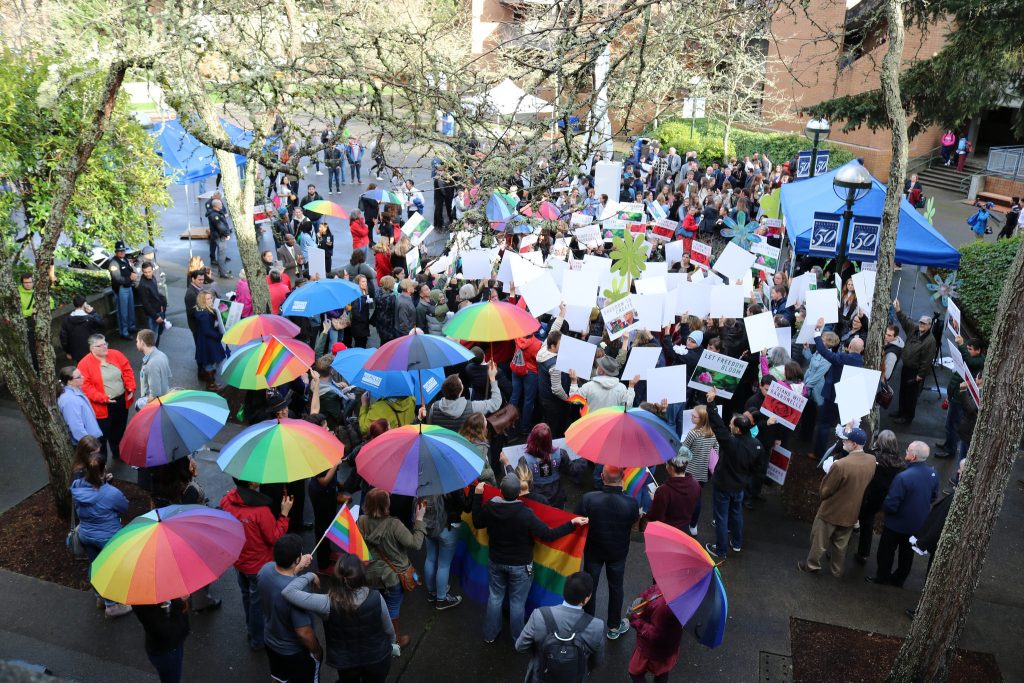 Protestors demonstrate outside the Carlson Theater