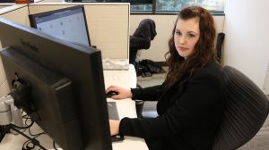 Andrea at work in the offices of CliftonLarsonAllen