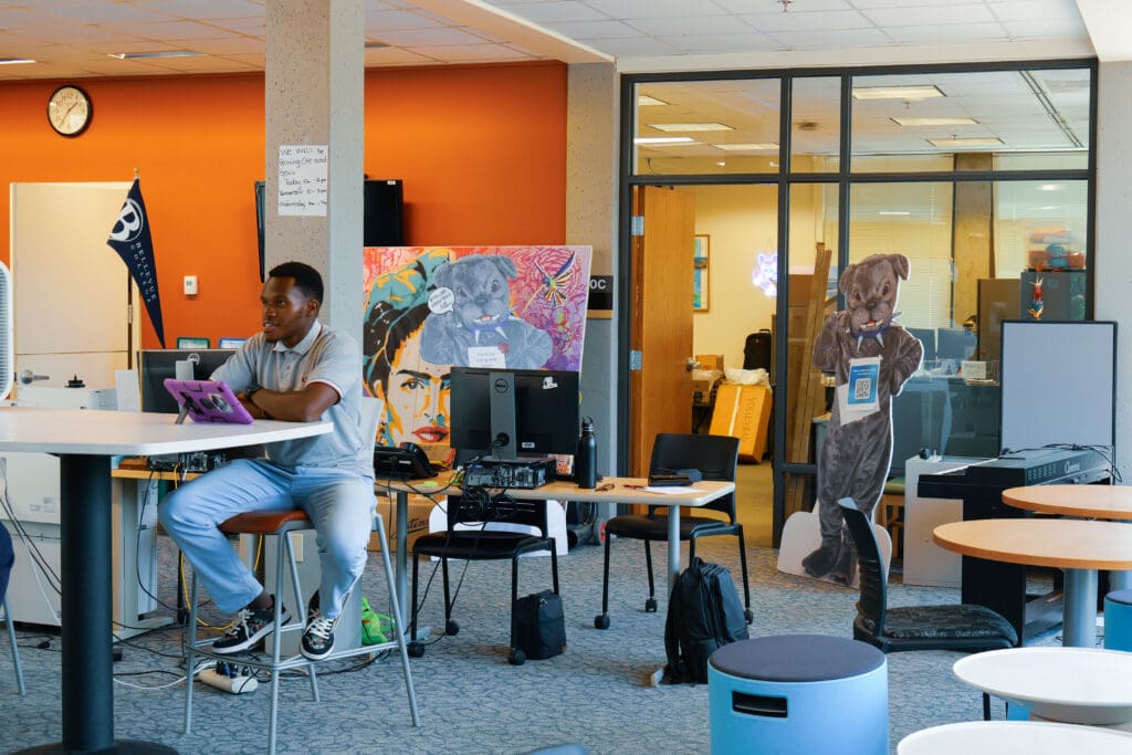 Student leaders at portable desks outside L100C