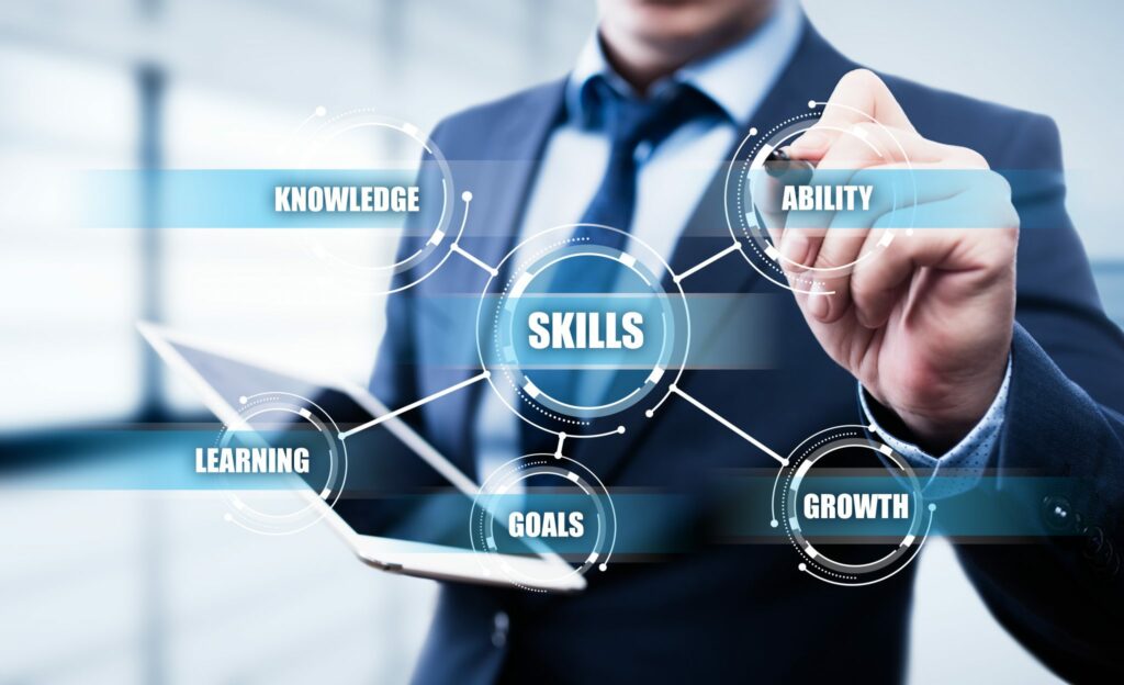 Person in suit surrounded by words related to success and learning